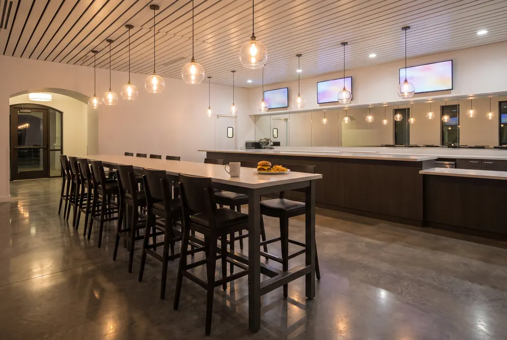 CMJ Express café with high tables at night