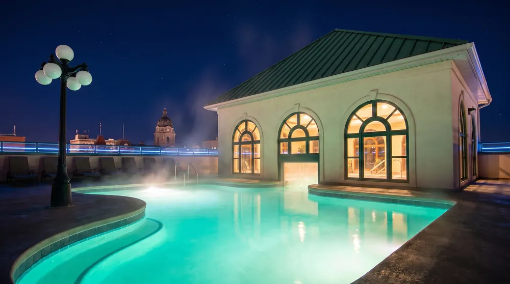 Temple Gardens rooftop mineral pool at night